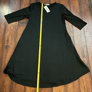 Missky Black Flared Midi Dress with Three-Quarter Sleeves